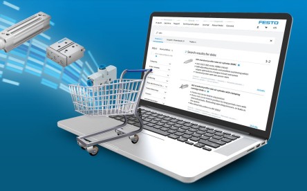 一台访问 Festo 在线商城的笔记本电脑，显示了购物车和工业元件