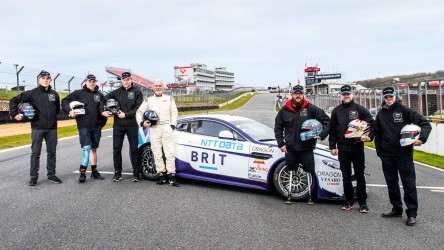 Team BRIT with sports car on the racetrack
