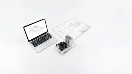集成阀的键合板组件与 CAD 设计数据和技术图纸并列展示。