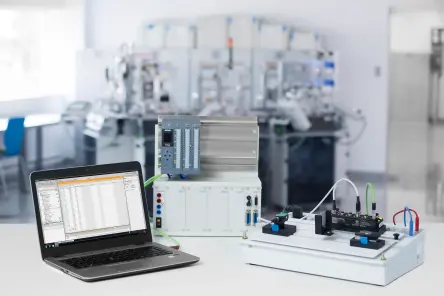 TP 1312 smart sensor setup with laptop, PLC, and connected sensor module.