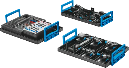 TP 1311 training trays featuring industrial sensors, wiring elements, and plug-in boards.